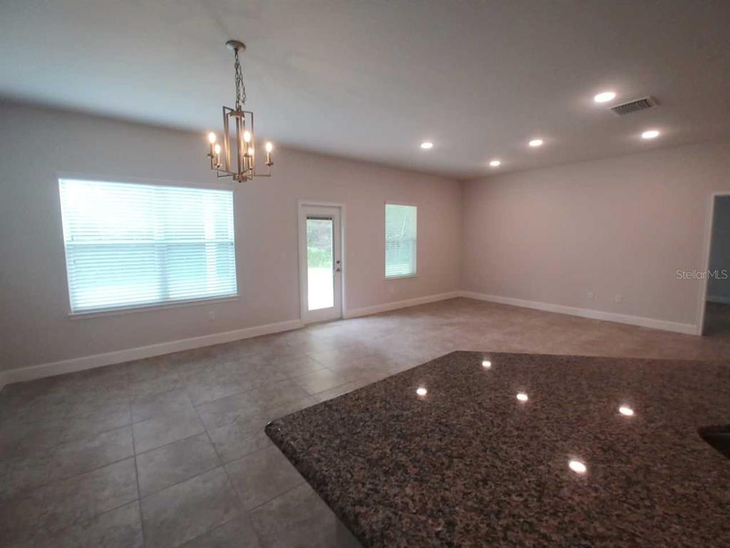 4380 Southwest 92nd Pl Road Ocala, FL 34476 - Photo 14 of 57 a view of livingroom and window