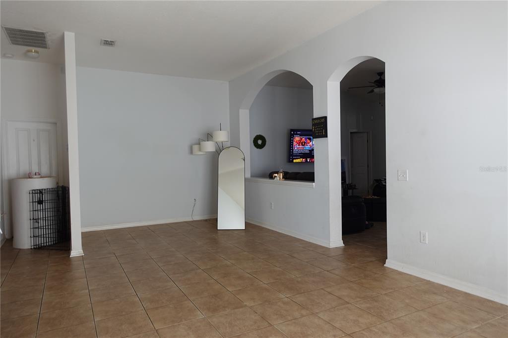 945 Tramells Trail Kissimmee, FL 34744 - Photo 6 of 36 a view of an empty room