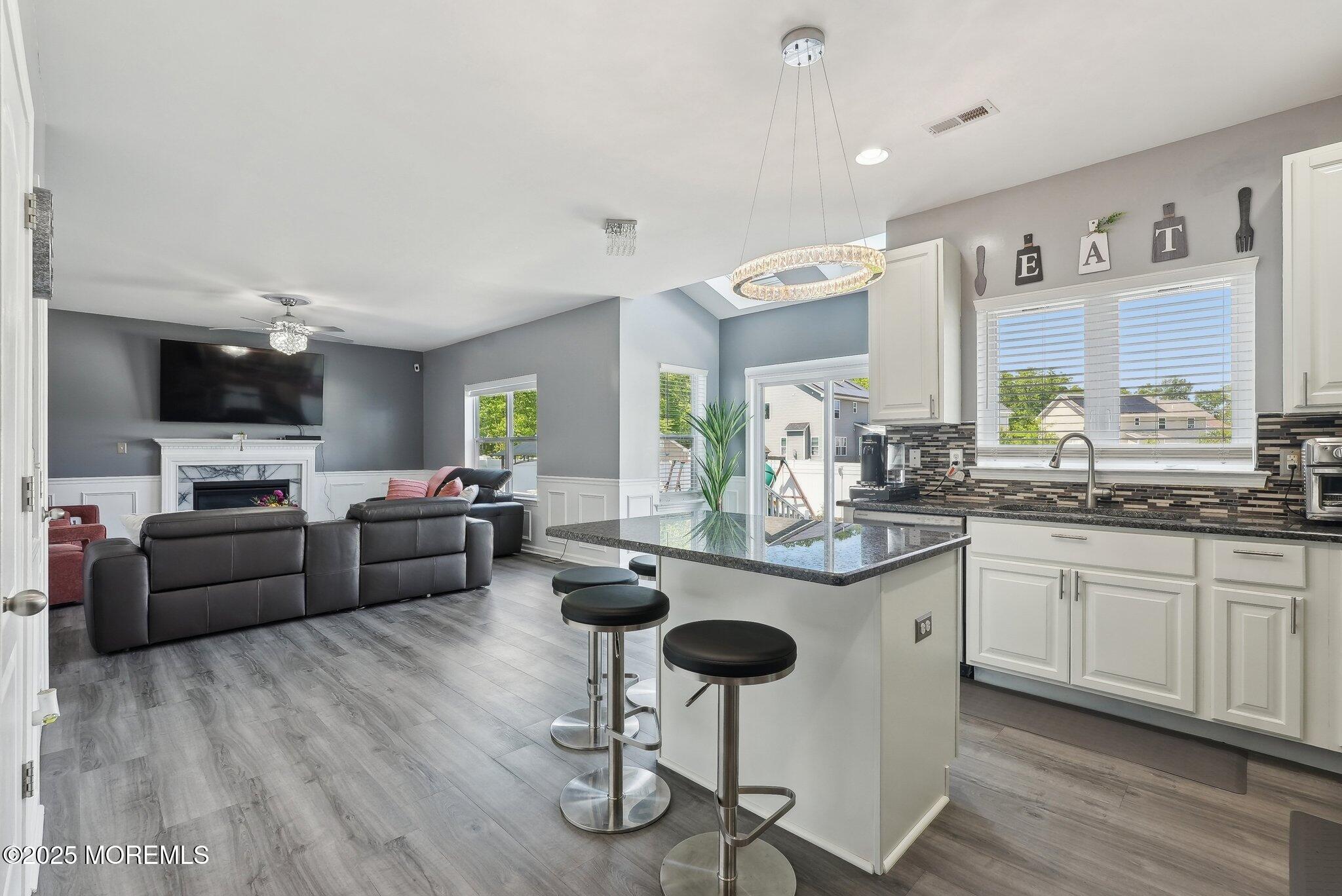 4 Bridle Path Bayville, NJ 08721 - Photo 12 of 44 a living room with furniture kitchen view and a large window