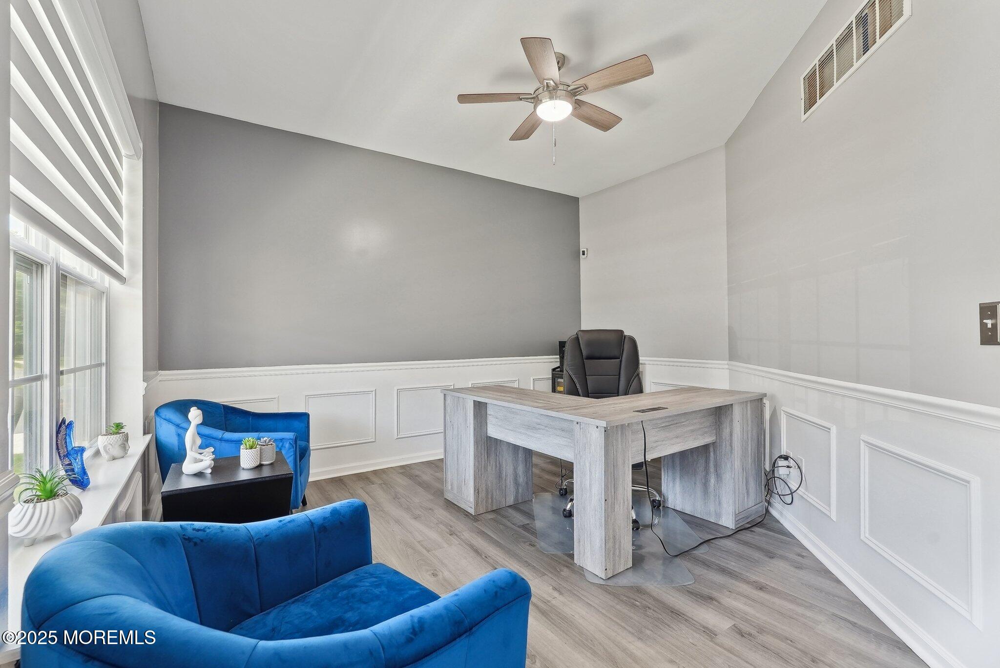 4 Bridle Path Bayville, NJ 08721 - Photo 19 of 44 a living room with furniture and a fireplace