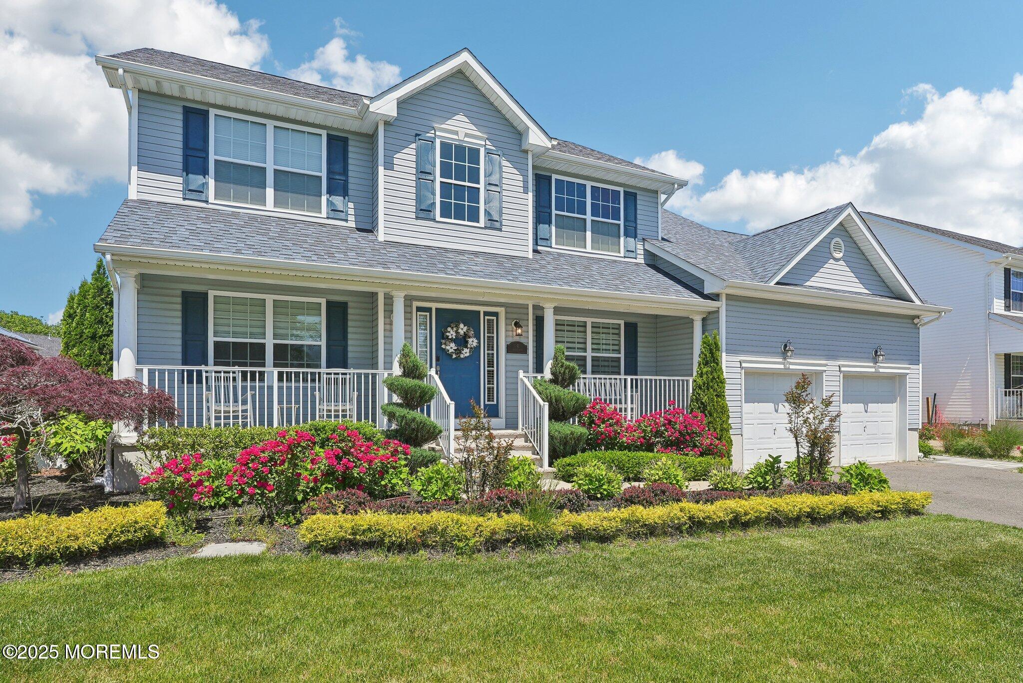 4 Bridle Path Bayville, NJ 08721 - Photo 2 of 44 front view of a house with a yard