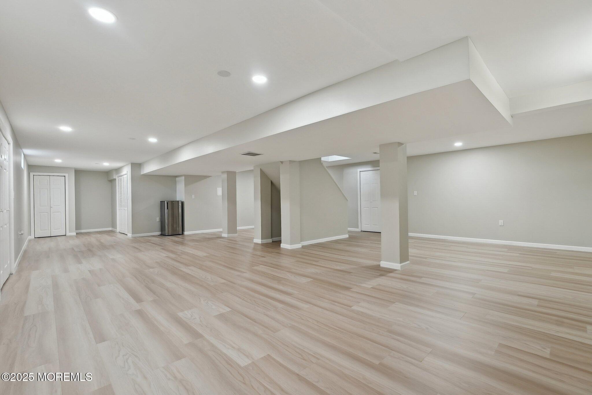 4 Bridle Path Bayville, NJ 08721 - Photo 33 of 44 a view of an empty room with wooden floor