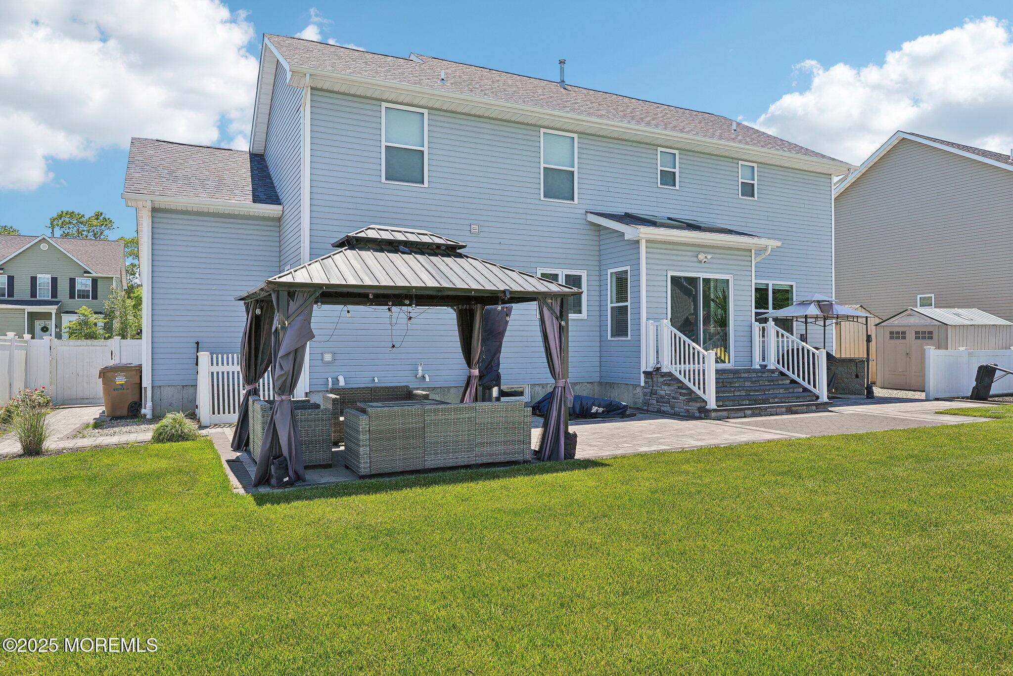 4 Bridle Path Bayville, NJ 08721 - Photo 38 of 44 a front view of a house with a garden and patio