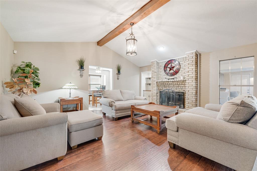 1923 Baylor Drive Richardson, TX 75081 - Photo 11 of 39 a living room with furniture and a fireplace
