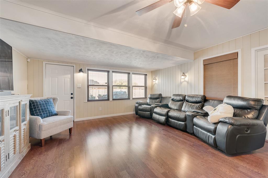 1923 Baylor Drive Richardson, TX 75081 - Photo 23 of 39 a living room with furniture and a large window