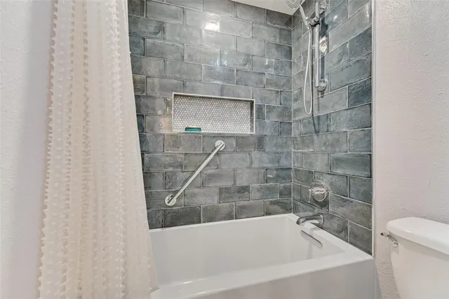 a bathroom with a bathtub