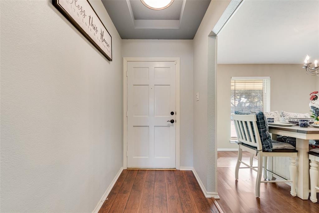 1923 Baylor Drive Richardson, TX 75081 - Photo 6 of 39 a view of a livingroom with furniture and wooden floor