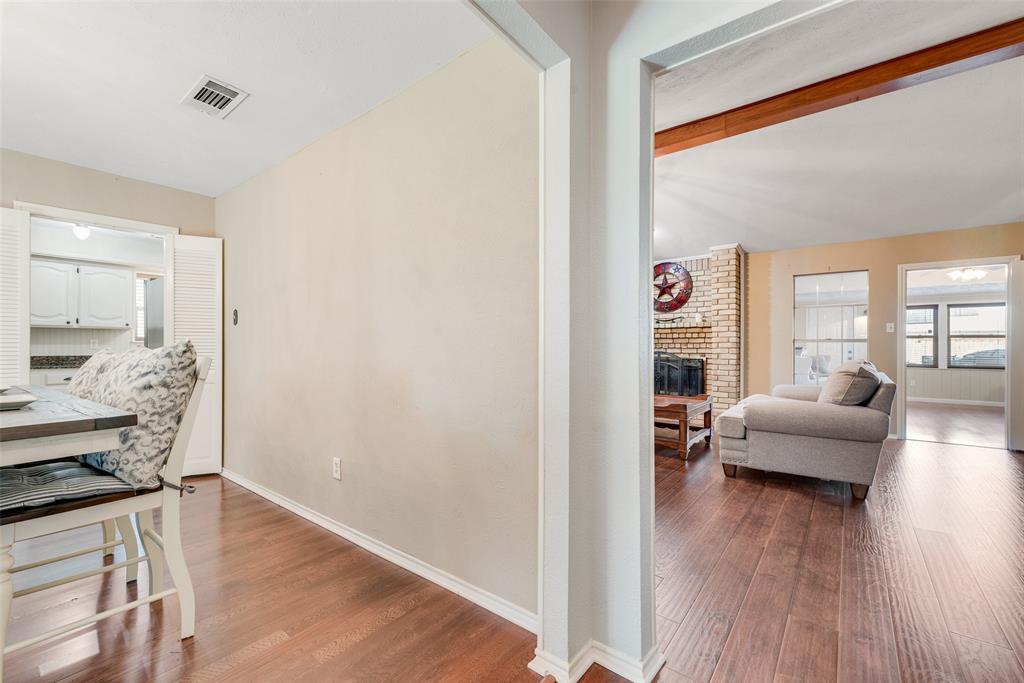 1923 Baylor Drive Richardson, TX 75081 - Photo 7 of 39 a living room with furniture and a wooden floor