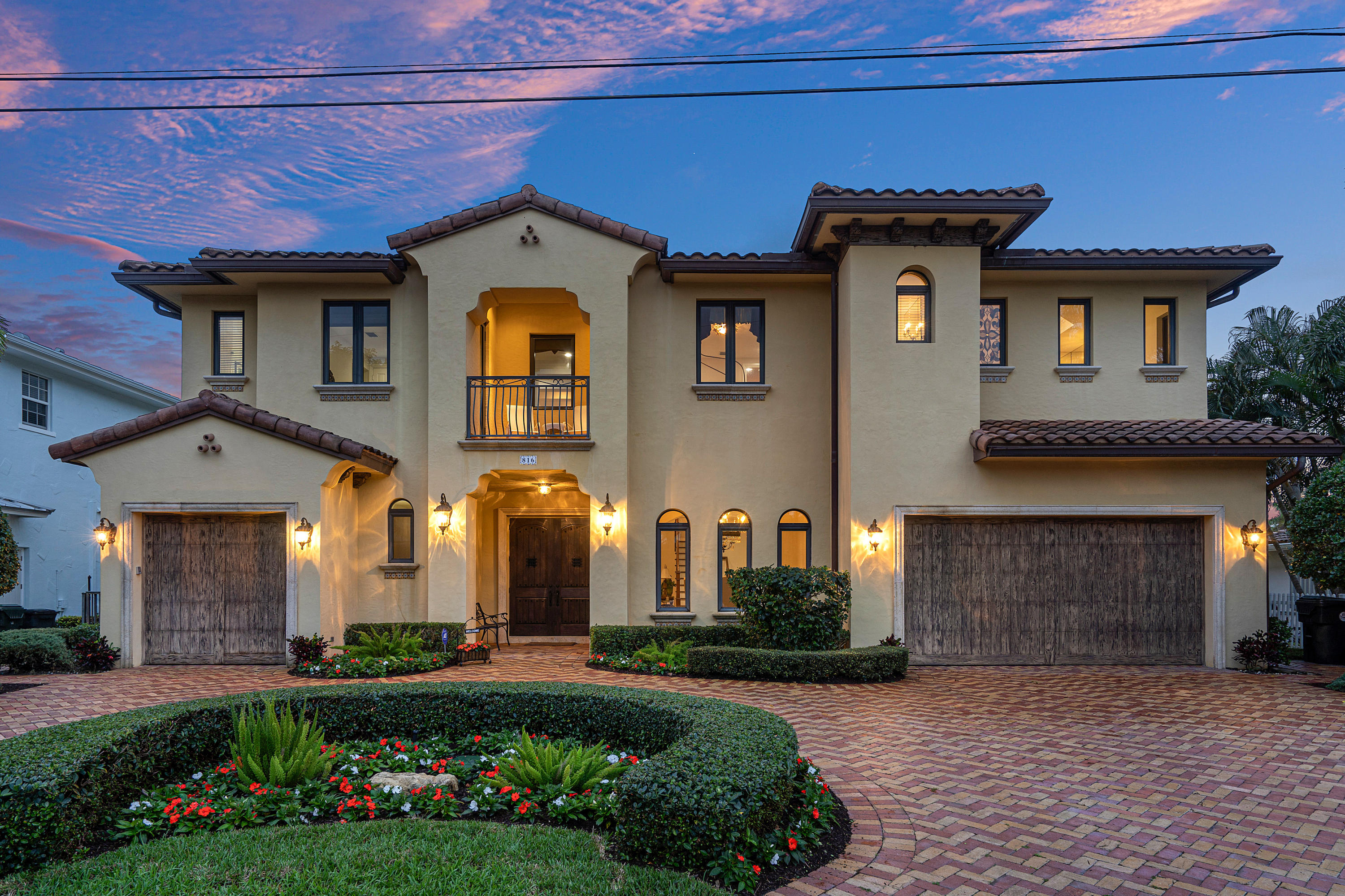 816 Northeast Bay Cove Street Boca Raton, FL 33487 - Photo 1 of 1 Front night view