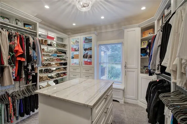 a view of a swimming pool with an outdoor space and seating area
