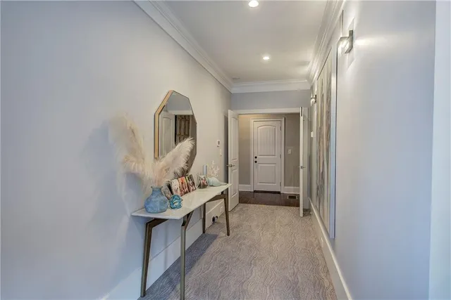 a view of a house with a yard and a garage