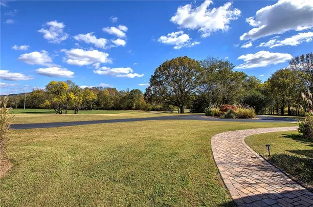 a view of a living room and dining room