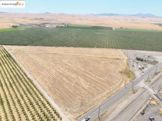 a view of an ocean and mountain