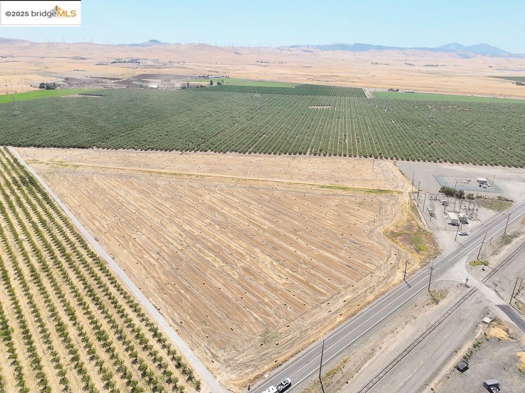 a view of an ocean and mountain