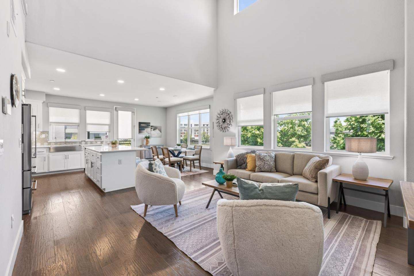 202 Market Street Milpitas, CA 95035 - Photo 1 of 30 a living room with furniture and a large window