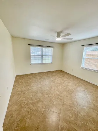 an empty room with windows