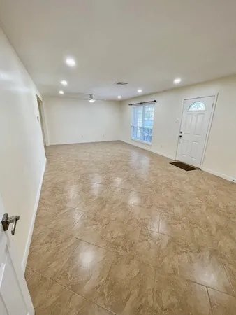 an empty room with a natural light