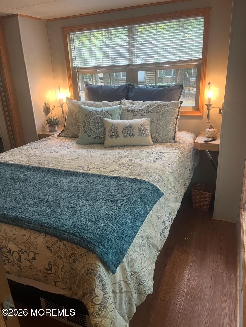 724 Monmouth Road, Unit 34 Cream Ridge, NJ 08514 - Photo 5 of 18 a bedroom with a bed and window