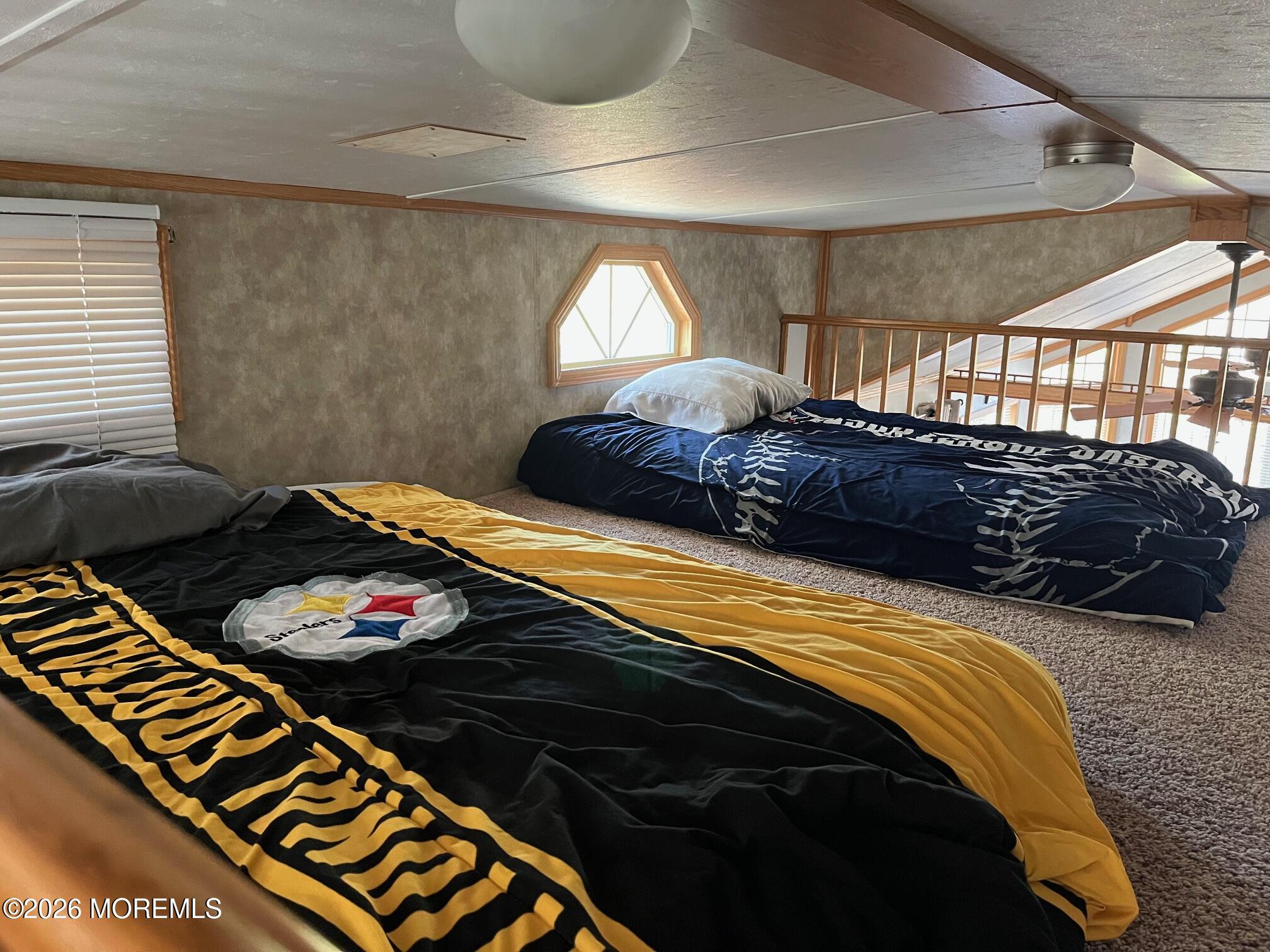 724 Monmouth Road, Unit 34 Cream Ridge, NJ 08514 - Photo 9 of 18 a bedroom with a bed and a closet