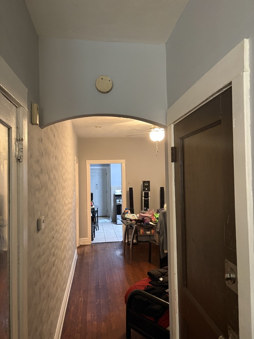 1711 North Austin Avenue Chicago, IL 60639 - Photo 4 of 13 a view of a living room and dining room