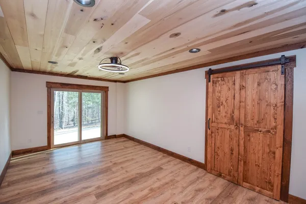 a view of entryway with wooden floor