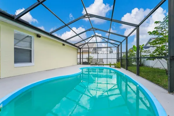 a swimming pool with yard