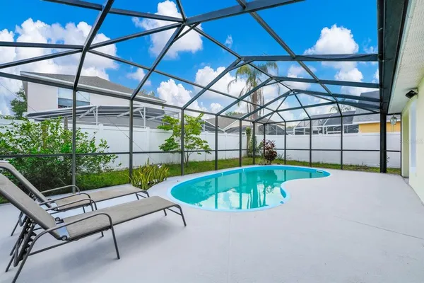a room with table and chairs