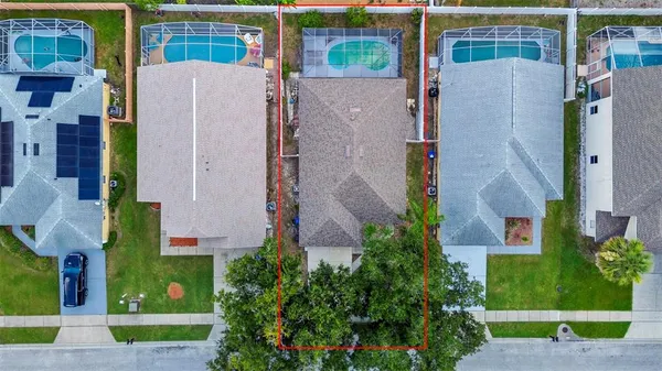 a view of multiple houses with yard