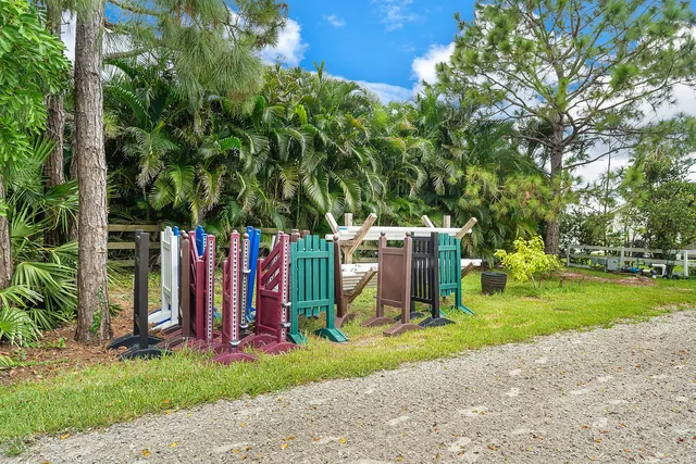 a view of a golf course with a lake