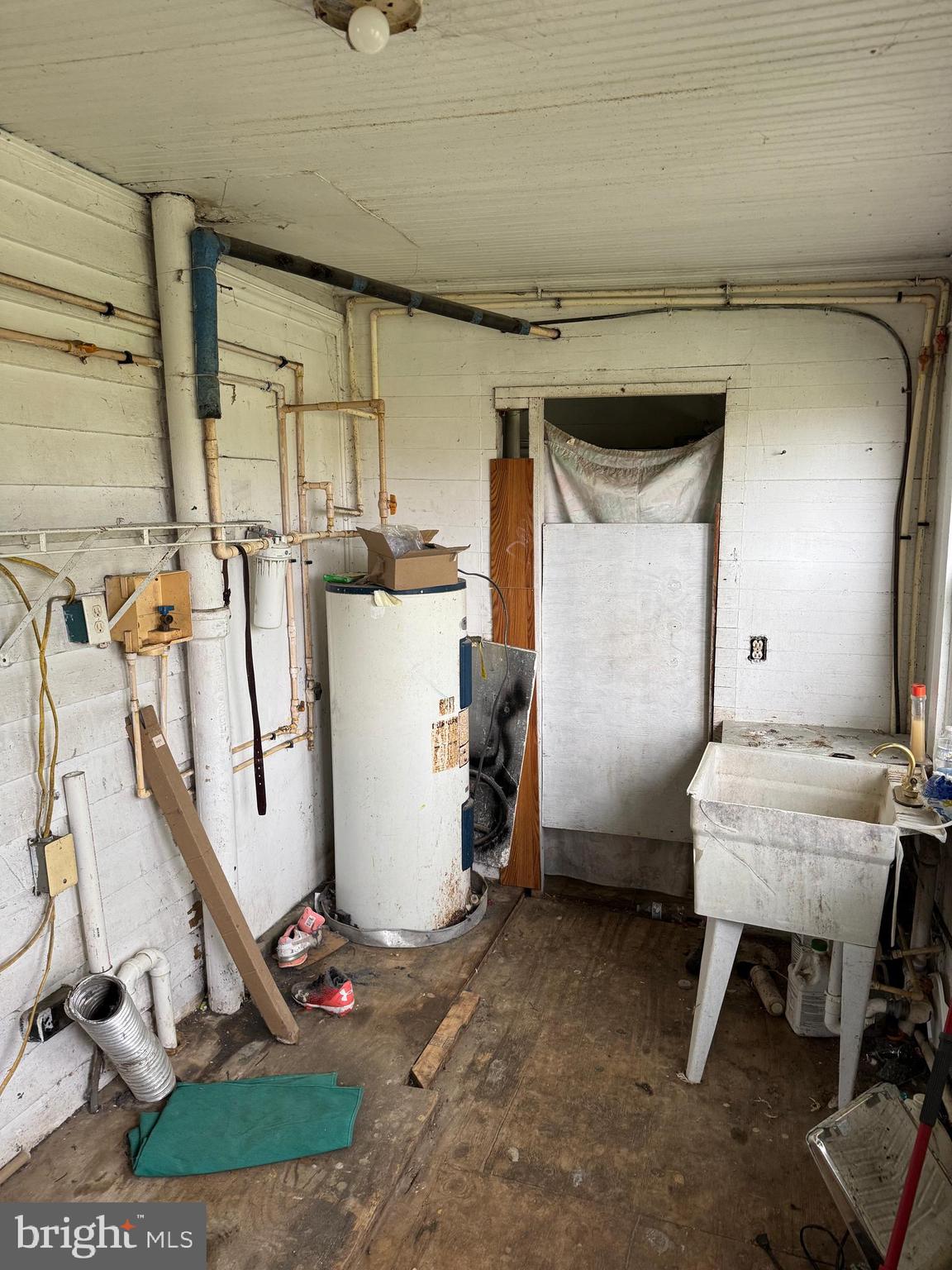 7382 Bullbegger Road Oak Hall, VA 23416 - Photo 18 of 18 a room with storage and utility