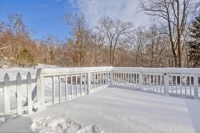 a view of a wooden fence