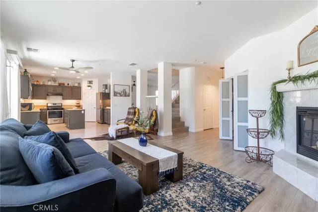 a living room with furniture and a rug