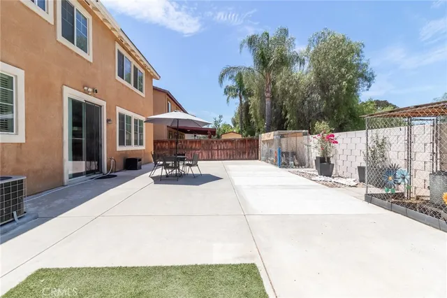 a view of a building with a patio