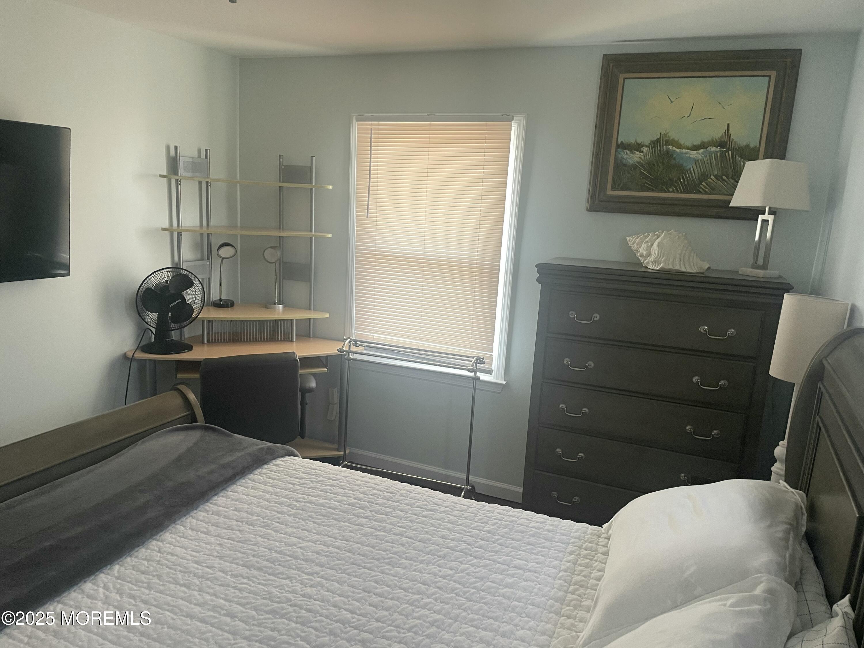 1510 R Bay Boulevard Seaside Heights, NJ 08751 - Photo 11 of 34 a bedroom with a bed and a window