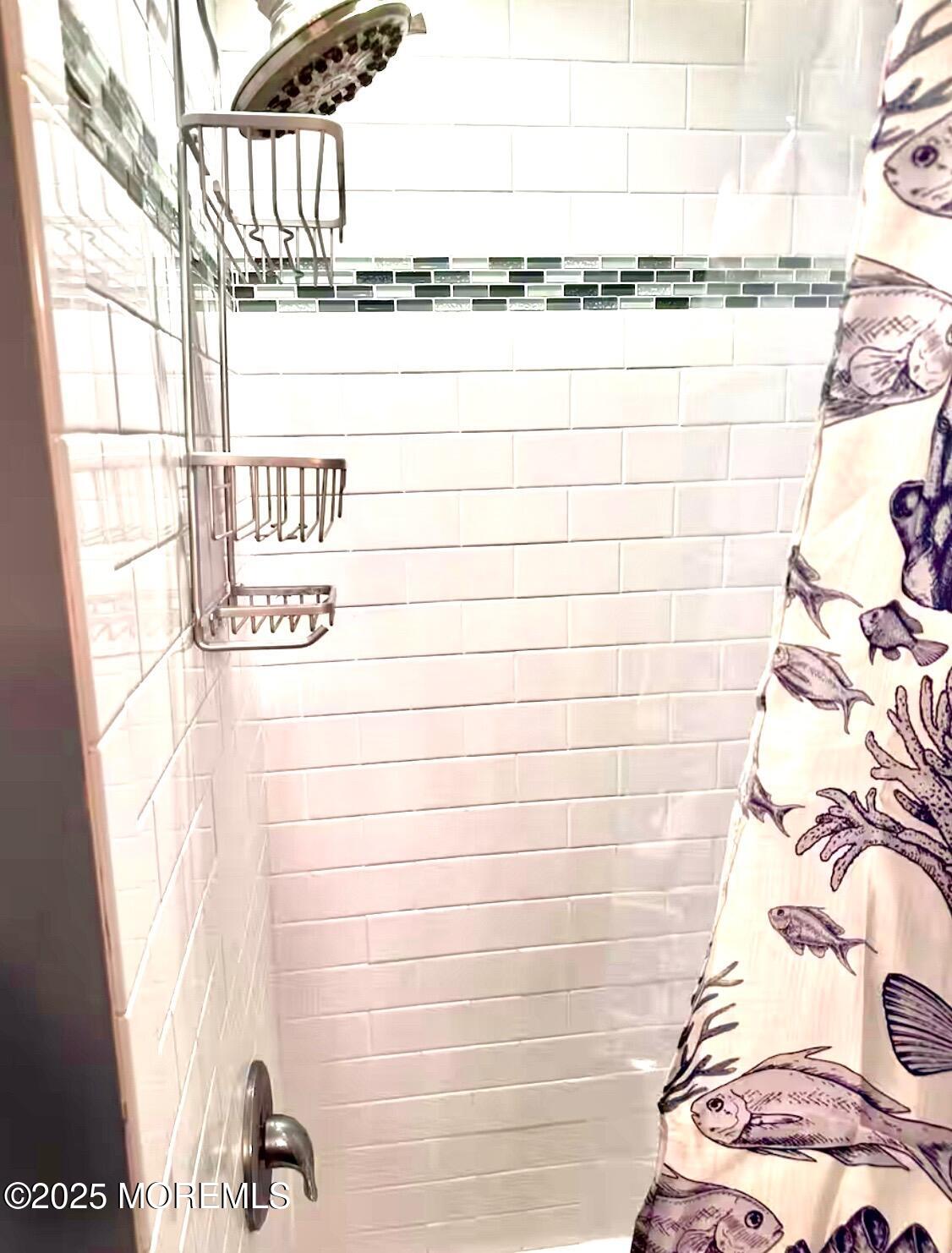 1510 R Bay Boulevard Seaside Heights, NJ 08751 - Photo 17 of 34 a close up of a shower