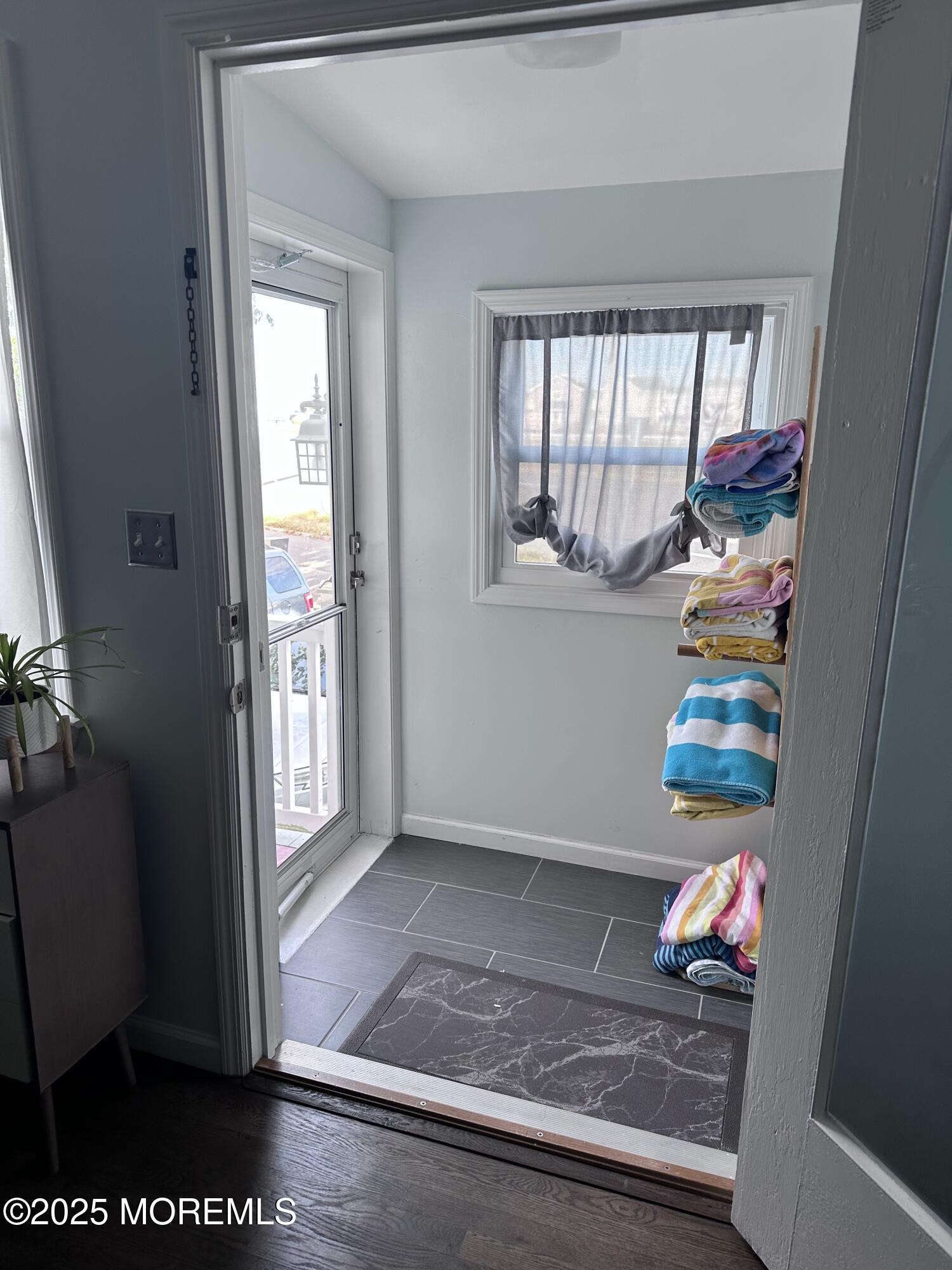 1510 R Bay Boulevard Seaside Heights, NJ 08751 - Photo 20 of 34 a room with window and painting on the wall