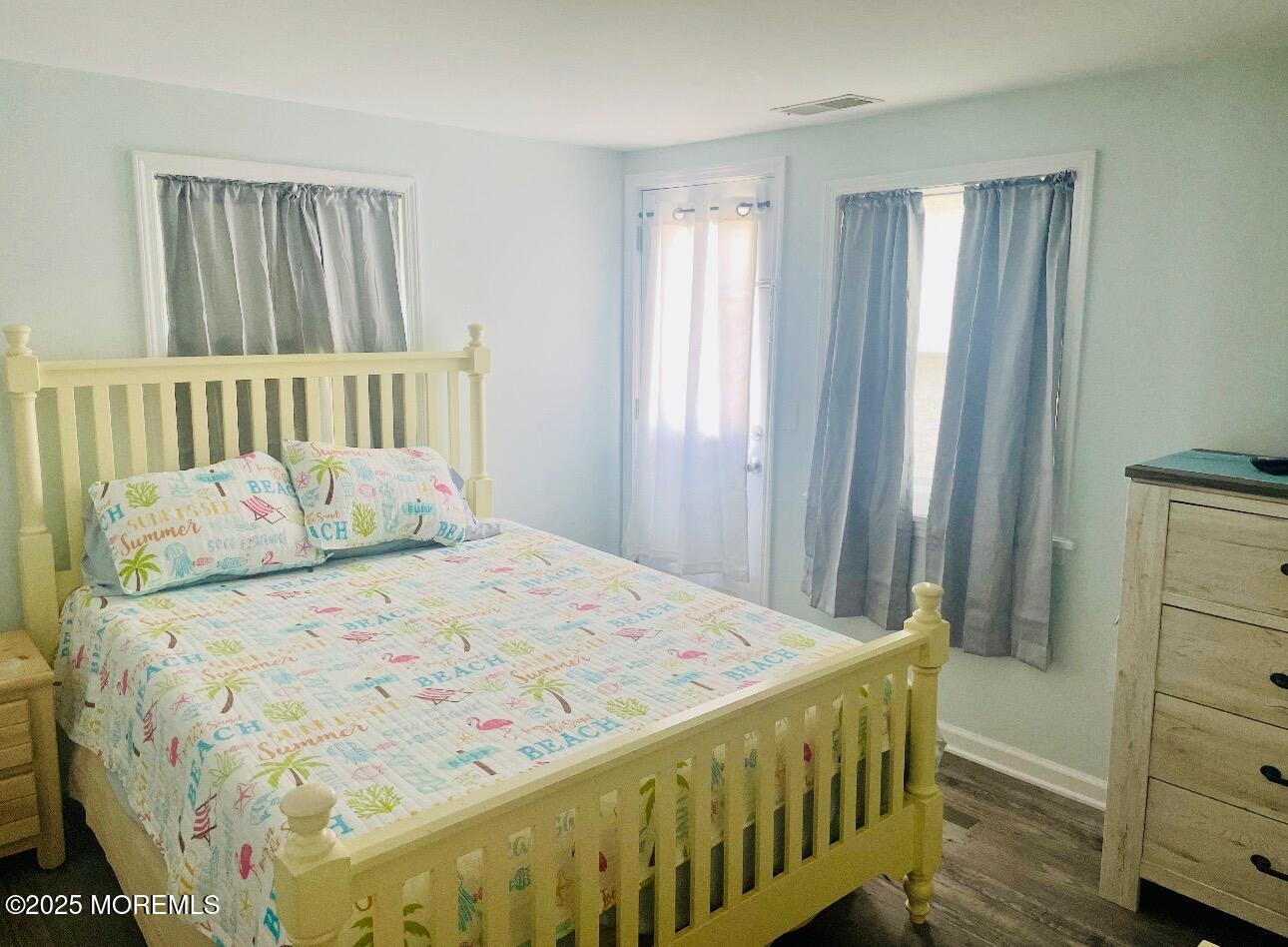1510 R Bay Boulevard Seaside Heights, NJ 08751 - Photo 23 of 34 a bedroom with a bed and a window