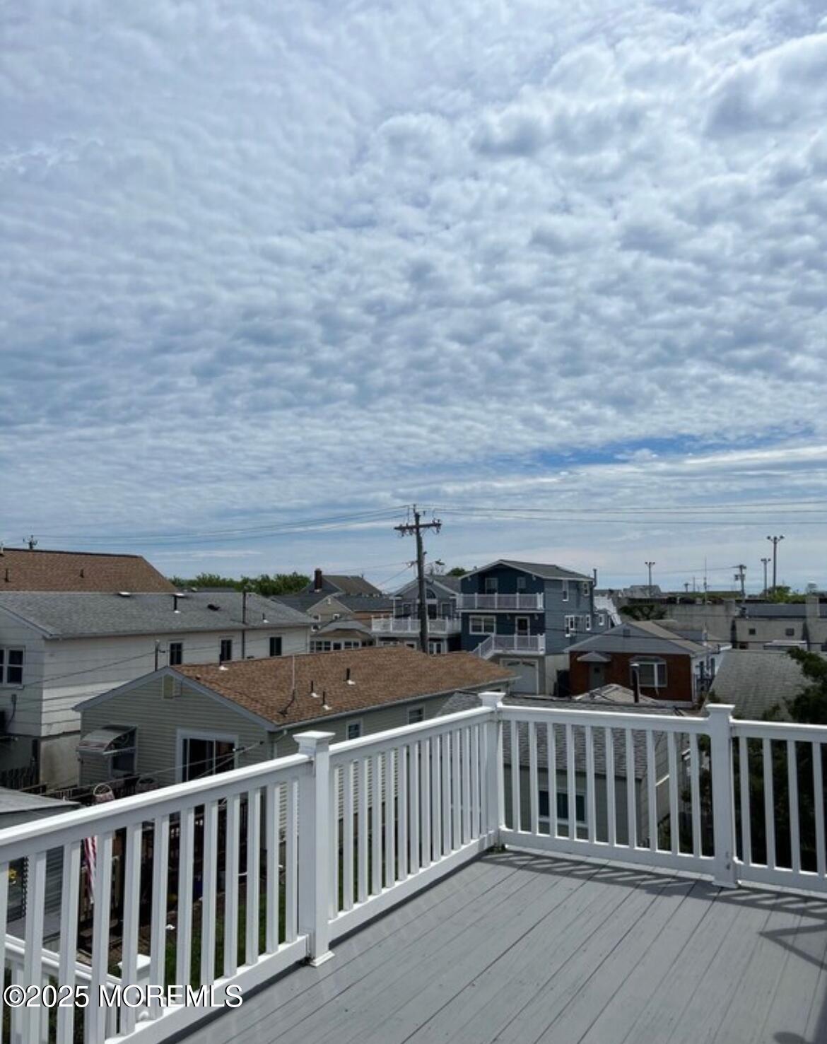 1510 R Bay Boulevard Seaside Heights, NJ 08751 - Photo 34 of 34 a view of a balcony with wooden floor