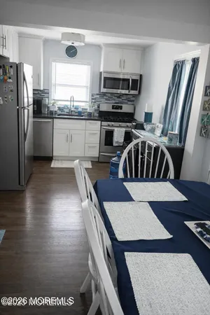 a bedroom with a bed and cabinets