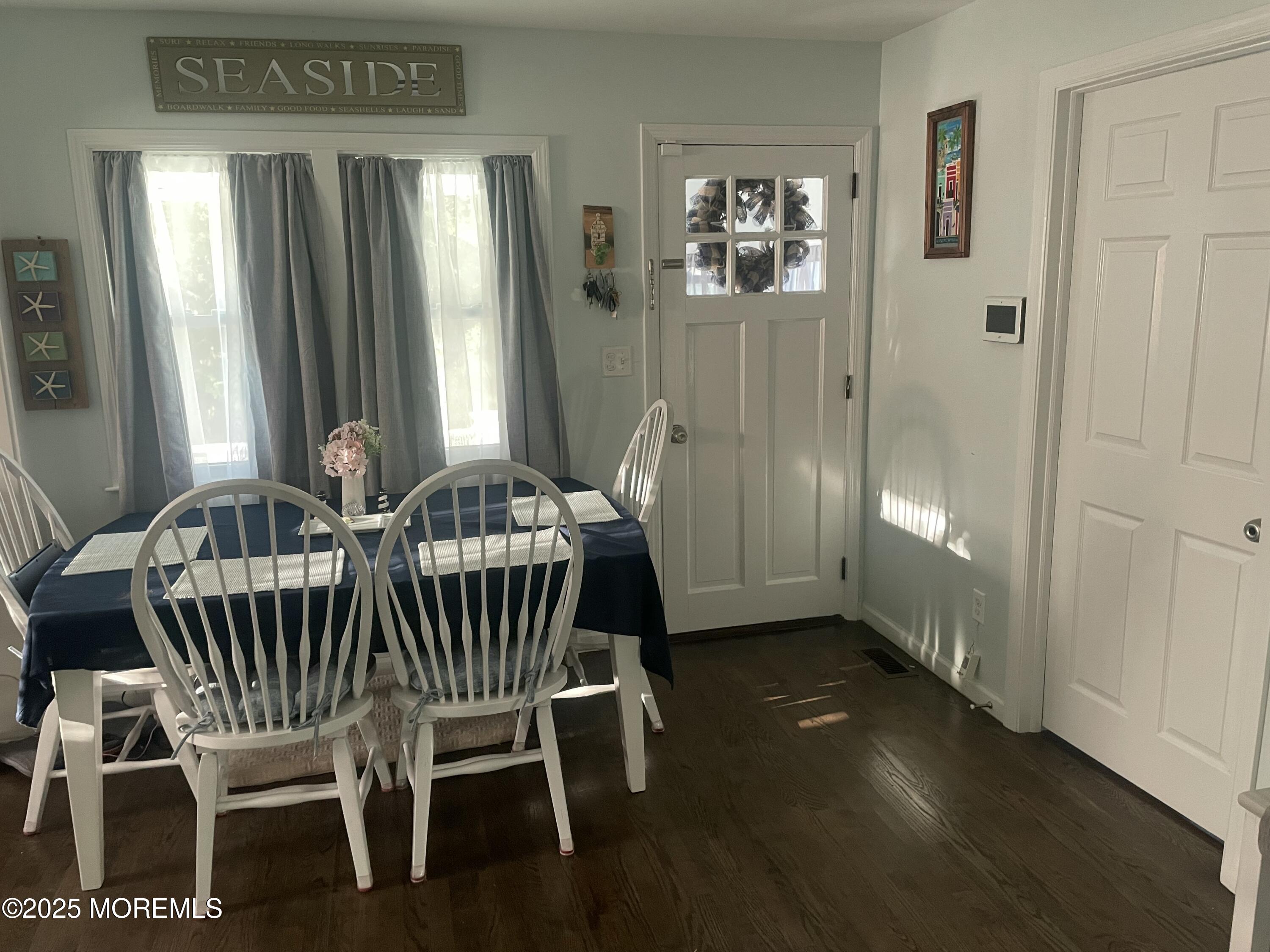 1510 R Bay Boulevard Seaside Heights, NJ 08751 - Photo 7 of 34 a view of a livingroom with furniture window and wooden floor