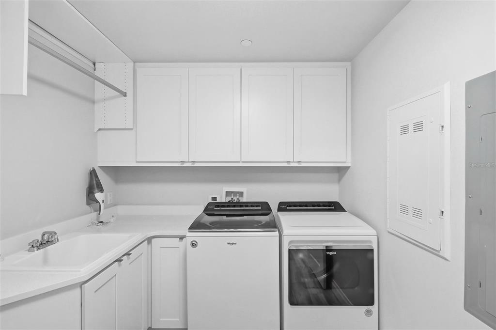800 Collany Road, Unit 302 St. Petersburg, FL 33715 - Photo 44 of 66 a view of utility room and sink