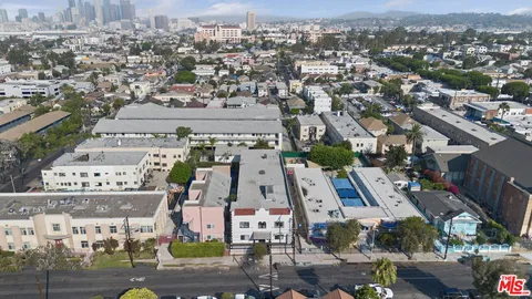 an aerial view of a city with lots of residential buildings