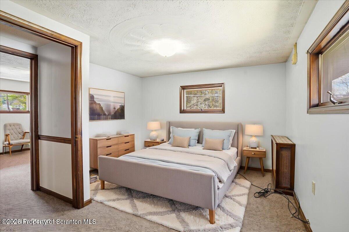 59 Tobyhanna Road Gouldsboro, PA 18424 - Photo 30 of 74 30-59_Tobyhanna_Rd_022 - Bedroom - Stand