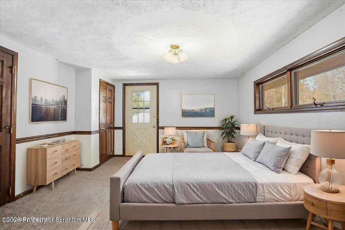 59 Tobyhanna Road Gouldsboro, PA 18424 - Photo 34 of 74 34-59_Tobyhanna_Rd_025 - Bedroom - Stand