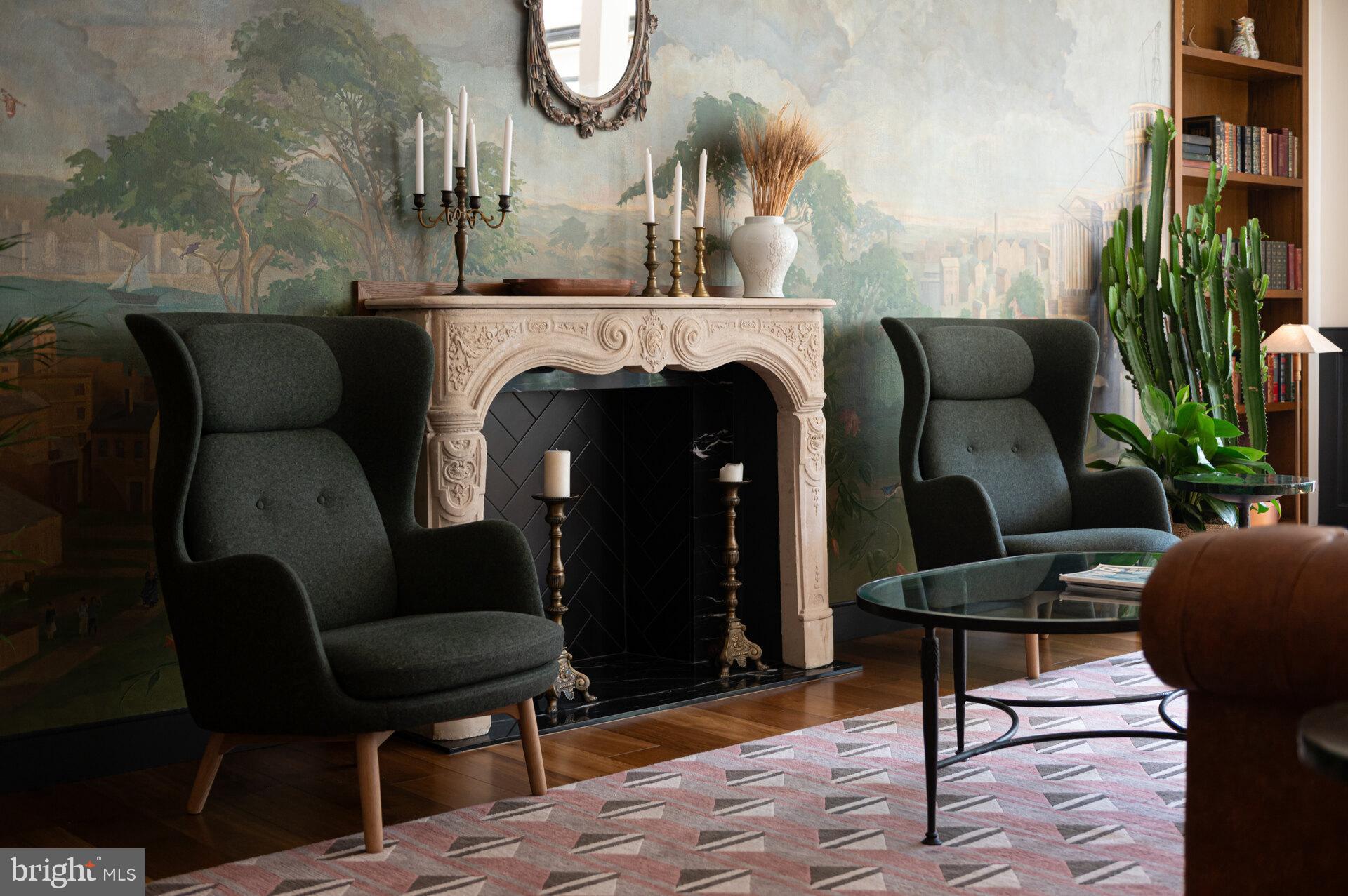 1339 E Street Southeast, Unit 309 Washington, DC 20003 - Photo 25 of 35 a living room with furniture and a fireplace