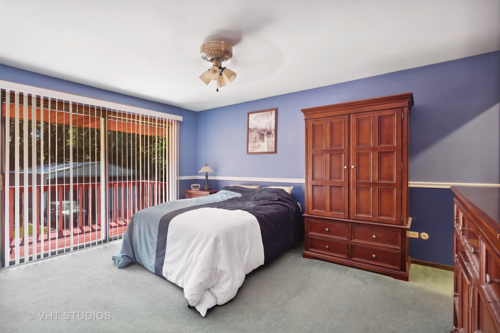 13115 Maple Road Mokena, IL 60448 - Photo 12 of 22 a bed room with a bed and a chair