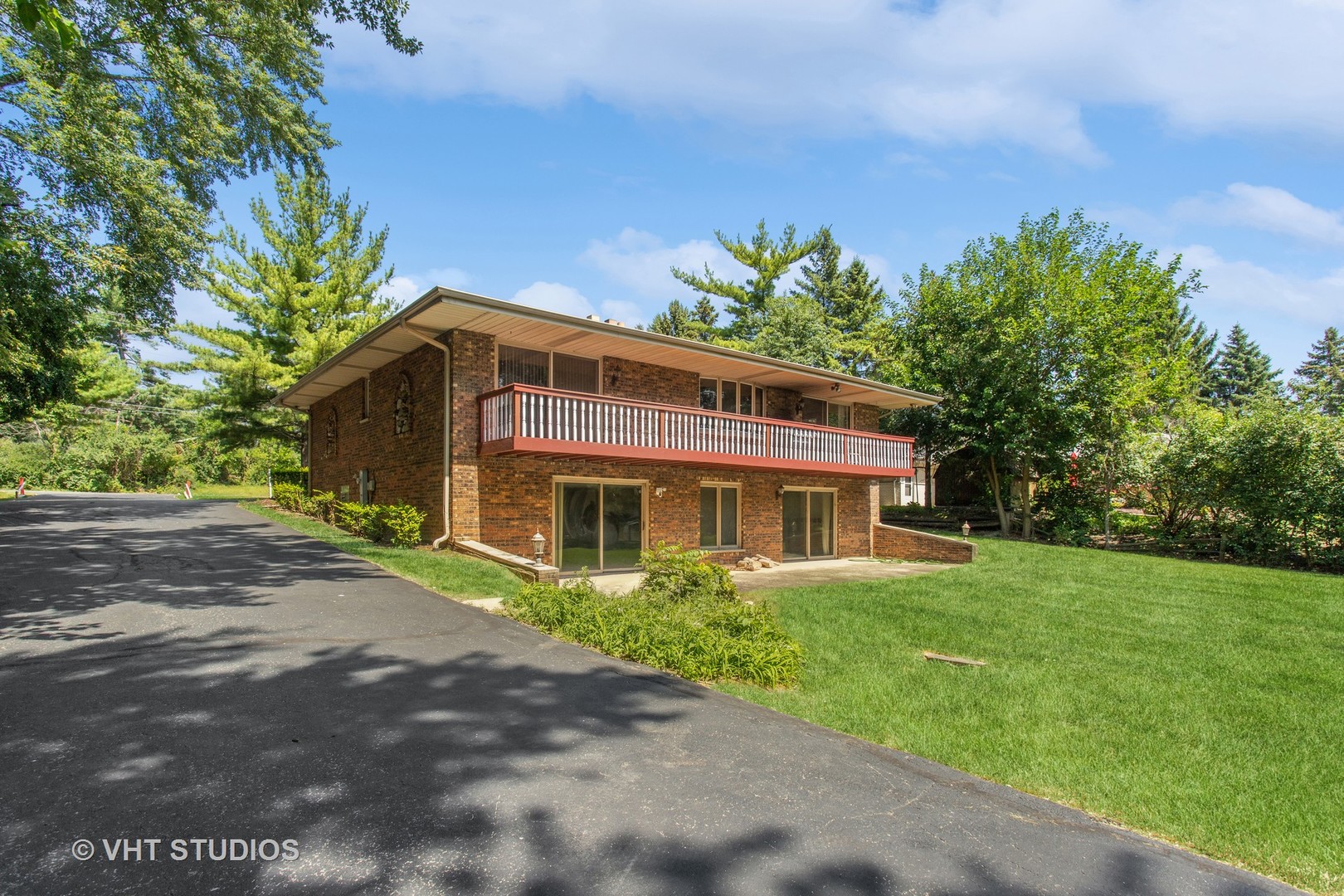 13115 Maple Road Mokena, IL 60448 - Photo 21 of 22 a front view of a house with a yard and trees