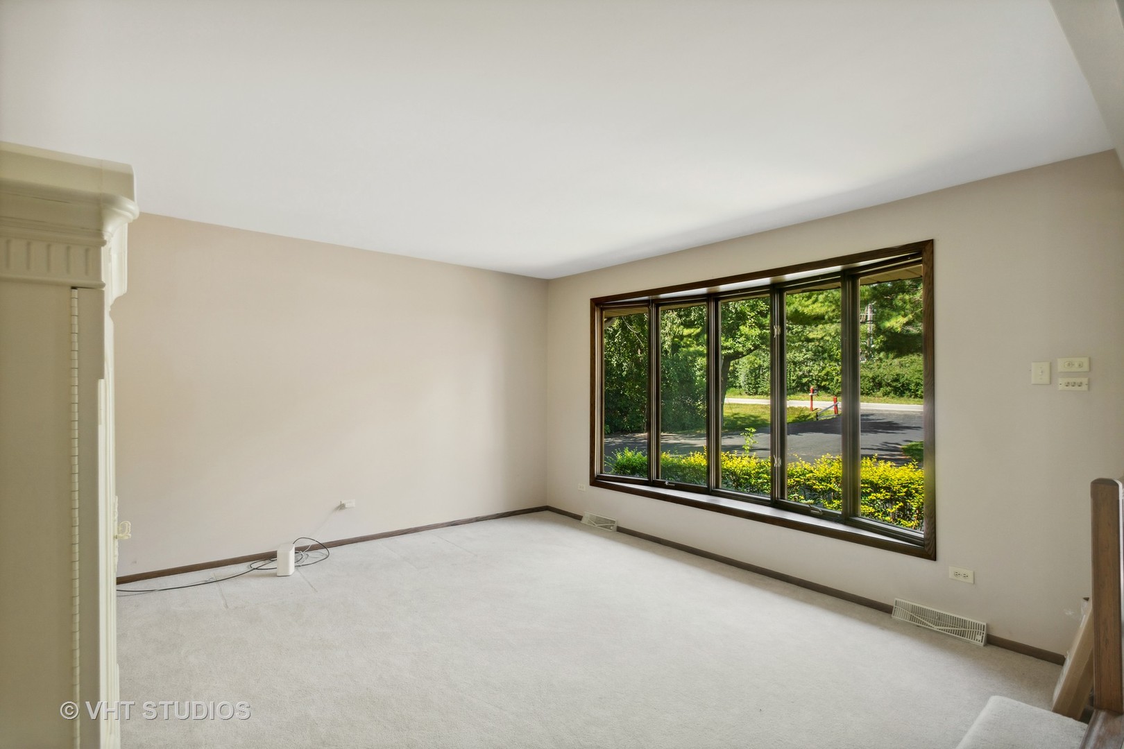 13115 Maple Road Mokena, IL 60448 - Photo 4 of 22 wooden floor in an empty room with a window