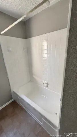 a bathroom with a bathtub
