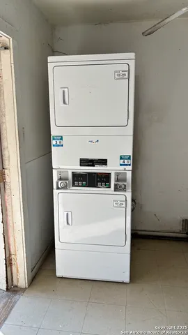 a view of a storage & utility room with washer and dryer